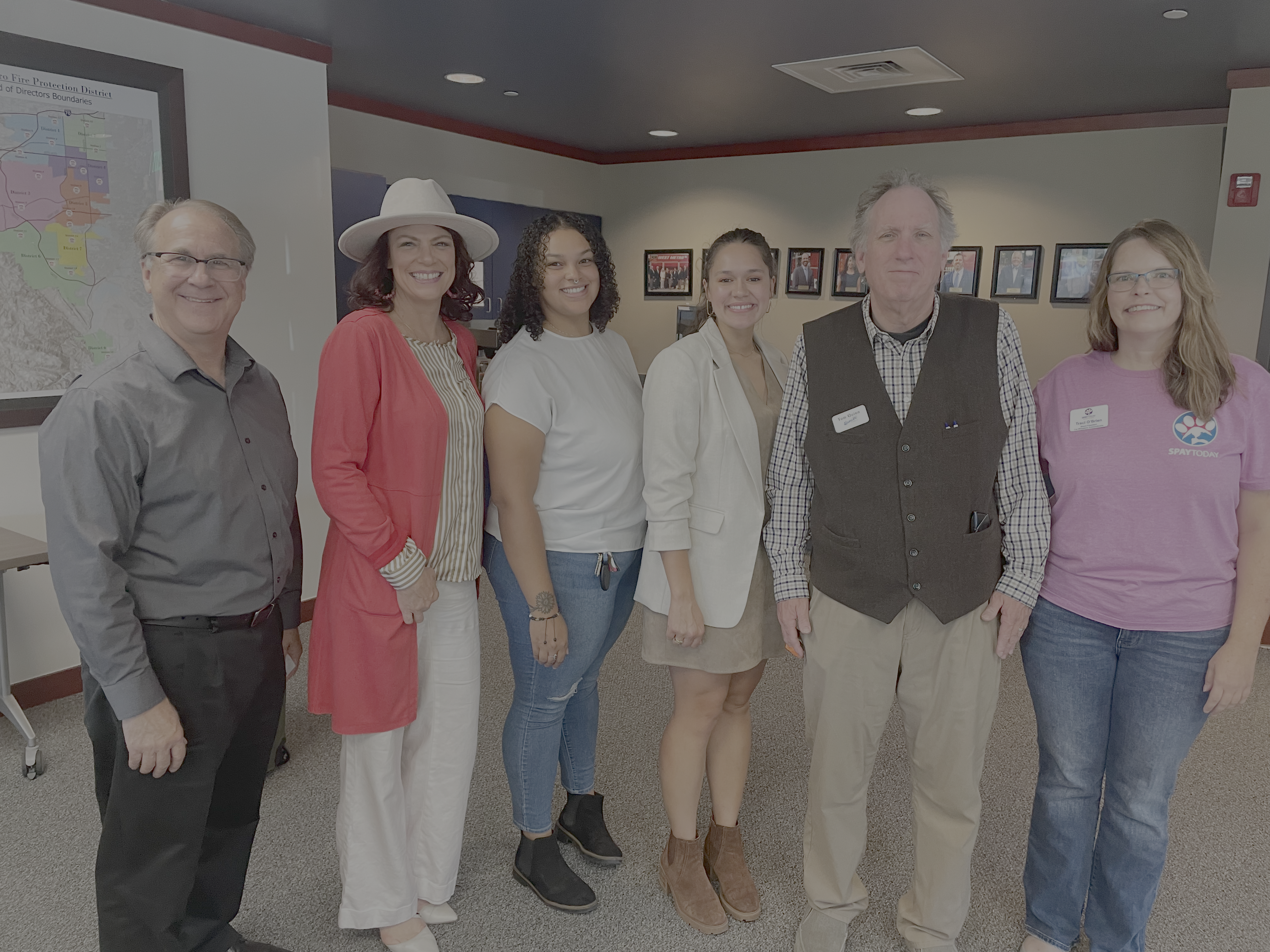 Image of nonprofit presenters and Tom Quinn